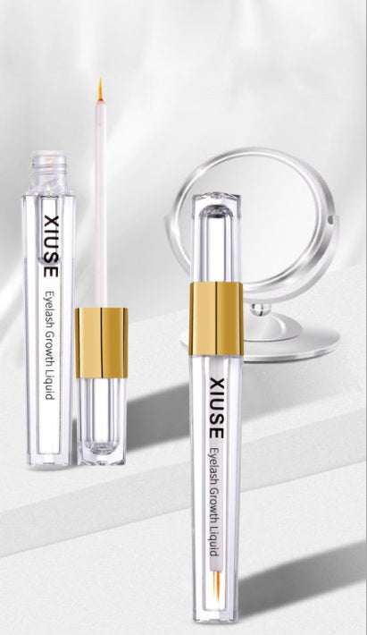 Nourishing eyelash growth liquid in clear, sleek tube with applicator brush.