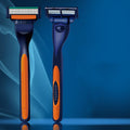 Manual razor with 4-layer blades for a smooth shave.