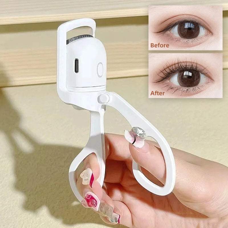 Portable electric heated eyelash curler with ergonomic design for long-lasting curls; ideal for quick styling and travel.