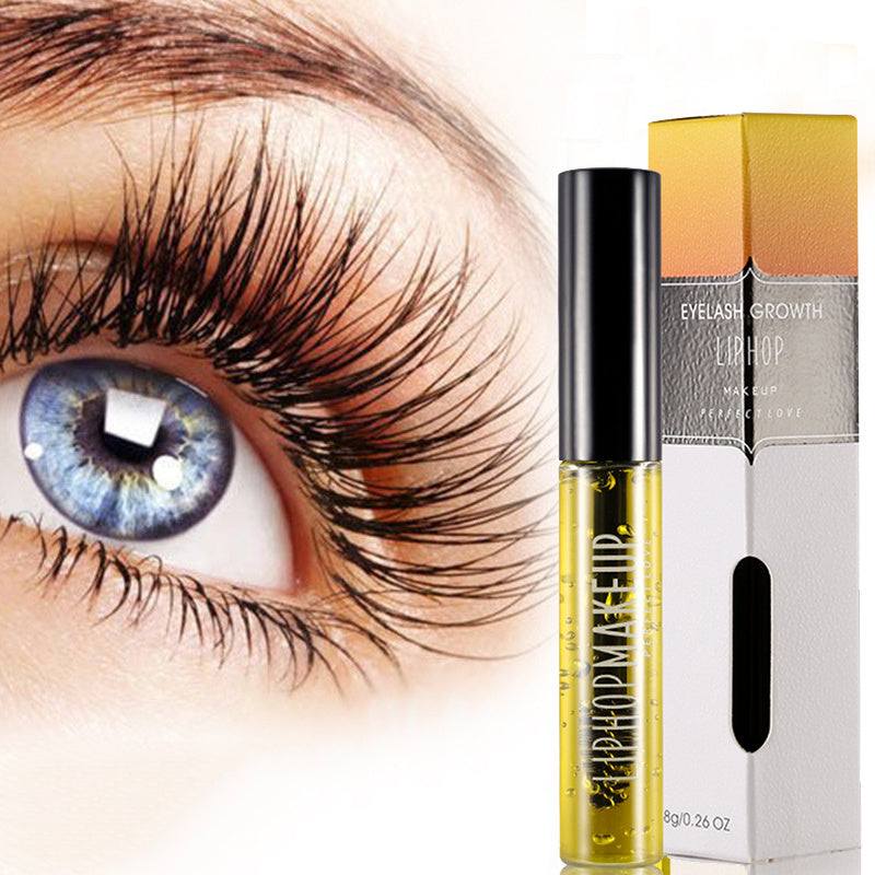 Eyelash nourishing serum for longer, fuller eyelashes with applicator brush.