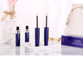 Cavilla Eyelash Growth Liquid bottles on a table with open applicators.