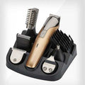 Electric clippers 11 1 multifunction set with accessories, gold and black design.