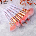 Multifunctional makeup brush set with premium nylon bristles and sleek design for professional precision.