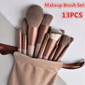 13pcs pink professional makeup brush set with soft fur, including brushes for eye shadow, foundation, blush, and more.