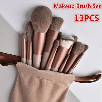 13pcs pink professional makeup brush set with soft fur, including brushes for eye shadow, foundation, blush, and more.