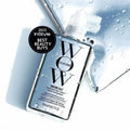 COLOR WOW Dream Coat Anti-Frizz Hair Mask Spray with bottle on wet surface, 200ml, 2023 InStyle Best Beauty Buys.