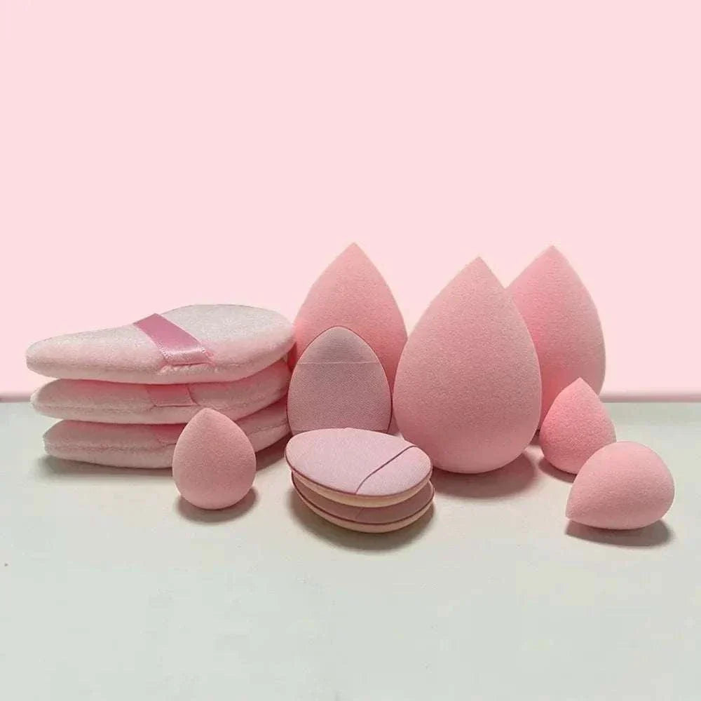 12/14 Piece Makeup Sponge Set with storage bottle, various pink cosmetic sponges on a light pink background.