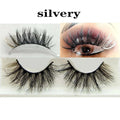 Silvery color fake eyelashes with volume for a glamorous look.