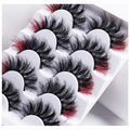 7 pairs of color volume fake eyelashes in a white tray with red and black mink lashes for a glamorous look.