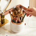 360° rotating makeup brushes holder with clear cover and storage compartments, portable desktop cosmetic organizer.