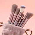 13pcs pink professional makeup brush set with soft fur, including brushes for eye shadow, foundation, blush, and more.