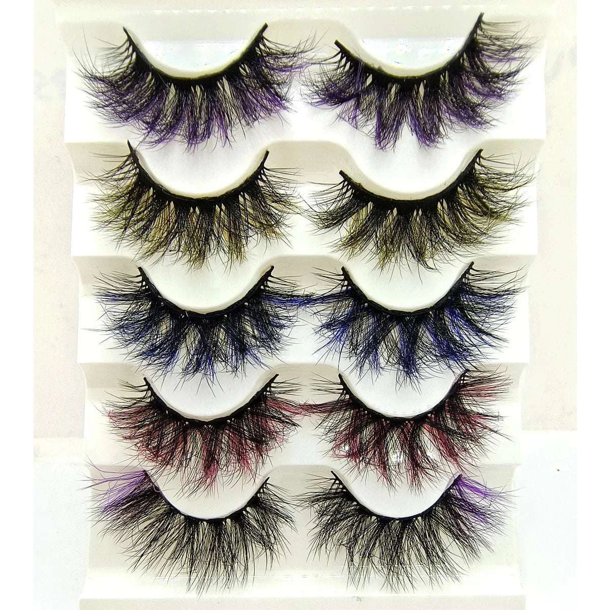 7 pairs of colorful volume mink eyelashes in vibrant shades.