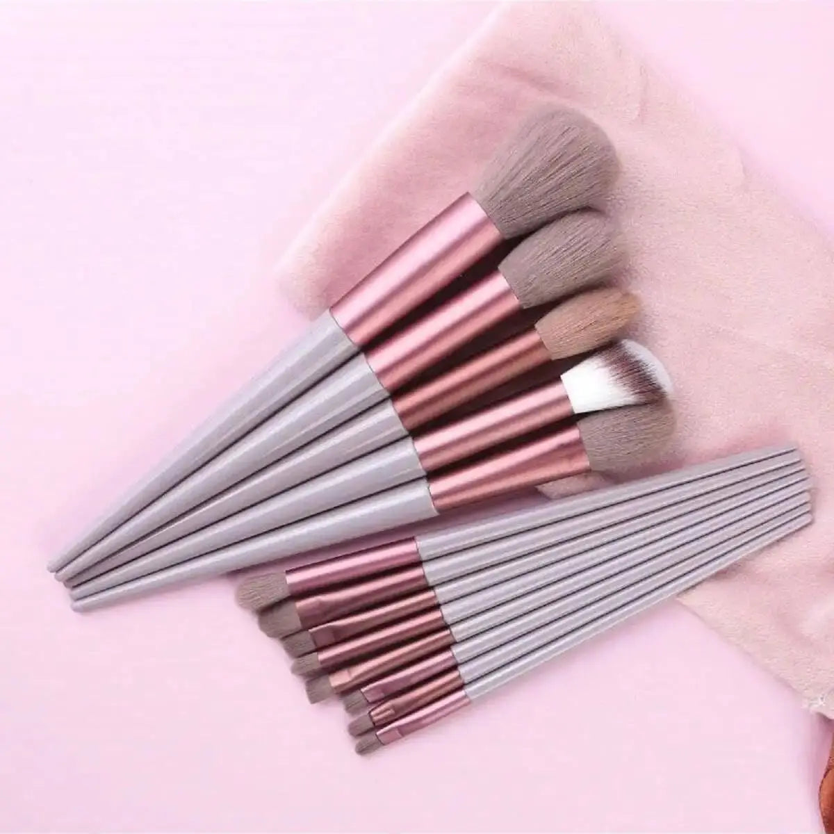 13pcs pink professional makeup brush set with soft fur, including brushes for eye shadow, foundation, blush, and more.