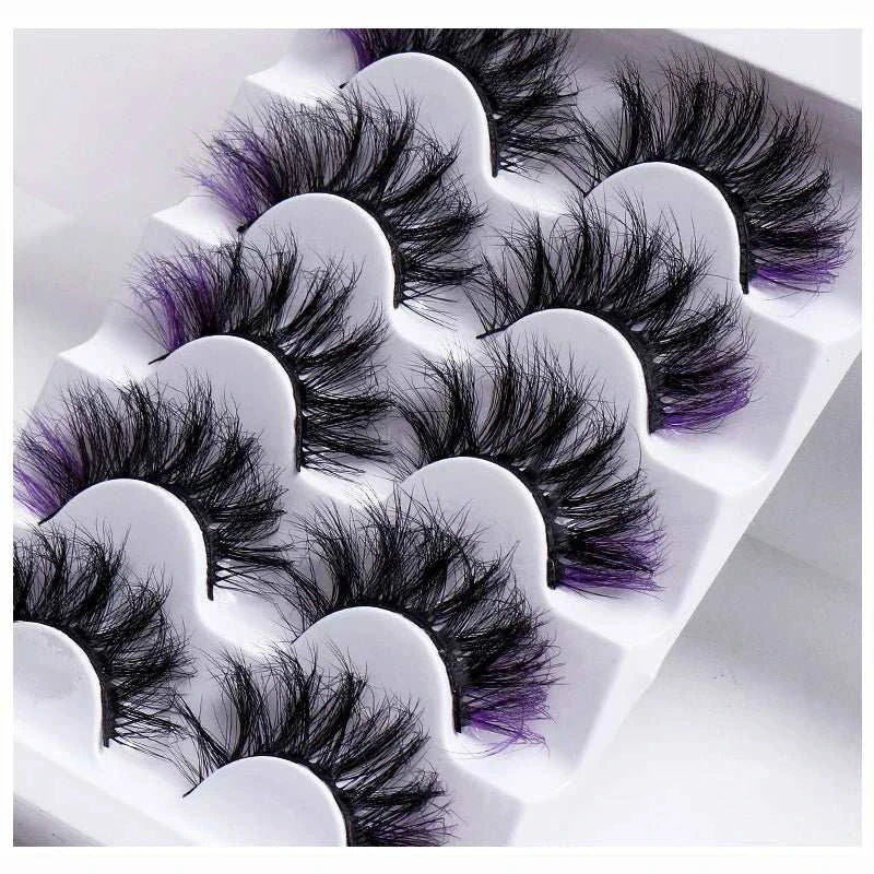 7 pairs of colorful volume fake mink eyelashes in a box.