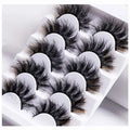 7 pairs of color volume fake eyelashes in a tray.