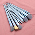 13 PCS green makeup brushes set including eye shadow and foundation brushes displayed on a soft background.